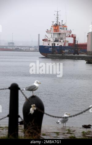 Looking across the East Float dock in Birkenhead, part of the Wirral Waters development on the banks of the river Mersey. Wirral Waters will form part of the Liverpool City Region Freeport, which was announced recently by the Conservative government. Stock Photo