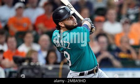 Seattle Mariners' Eugenio Suarez bats against the Cleveland Guardians  during the third inning of a baseball game, Sunday, April 9, 2023, in  Cleveland. (AP Photo/Ron Schwane Stock Photo - Alamy