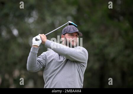 Former professional baseball player AJ Pierzynski watches his tee shot on  the 11th hole during the final round of the Tournament of Champions LPGA  golf tournament, Sunday, Jan. 23, 2022, in Orlando