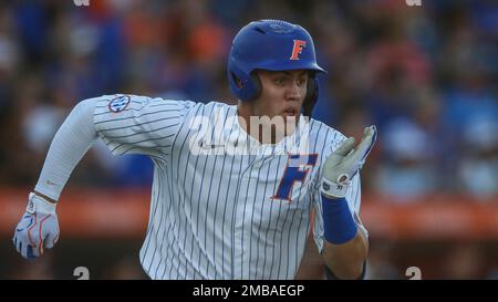 Florida outfielder Ty Evans (2) runs to first base during an NCAA regional  championship baseball game against Central Michigan on Friday, June 3, 2022  in Gainesville, Fla. (AP Photo/Gary McCullough Stock Photo - Alamy