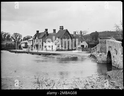 Riverside, Eynsford, Sevenoaks, Kent, 1885. The view from the south east looking across the River Darent towards The Plough Inn and the surrounding houses on Riverside with Eynsford Bridge in the right foreground. Also visible in this photograph are Plough Cottages, Tudor Cottage and a group of now demolished houses to the west of the Plough Inn. Stock Photo