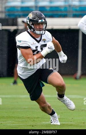 Jacksonville Jaguars inside linebacker Chad Muma (48) warms up