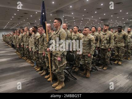 Soldiers assigned to the New York Army National Guard’s 1st Battalion, 69thInfantry, stand at attention during a farewell ceremony held on June 14, 2022, at the Jacob Javits Convention Center in New York City. The Soldiers headed for Fort Drum, New York for training after the ceremony and will be deploying to the Horn of Africa to conduct security missions there. Stock Photo