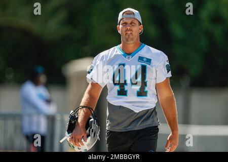 Carolina Panthers place kicker Eddy Pineiro (4) slaps hands with long  snapper JJ Jansen (44) after kicking an extra-point during an NFL football  game against the New Orleans Saints, Sunday, Sep. 25