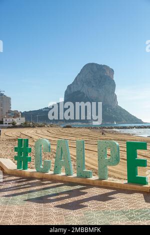 #Calpe Sign at the beach in Calpe with Penon de Ifach in background Stock Photo