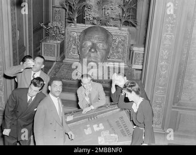 Portrait of Henry Allen, Joe Marsala, Teddy Wilson, Nesuhi Ertegun, Ahmet M. Ertegun, and Adele Girard, Turkish Embassy, Washington, D.C., 1938. Stock Photo