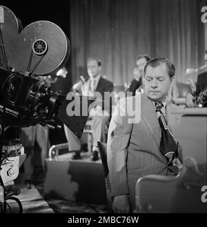 Portrait of Claude Thornhill, Sandy Siegelstien, Willie Wechsler, and Micky Folus, Columbia Pictures studio, the making of Beautiful Doll, New York, N.Y., ca. Sept. 1947. Stock Photo