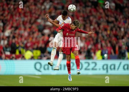 Liverpool's Andrew Robertson heads the ball during the Champions League  final soccer match between Liverpool and Real Madrid at the Stade de France  in Saint Denis near Paris, Saturday, May 28, 2022. (