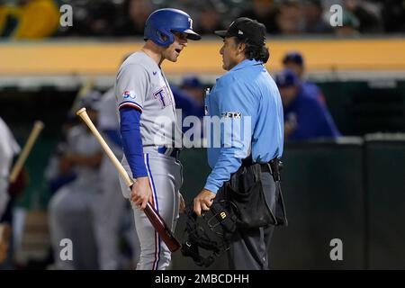 Texas Rangers left fielder Brad Miller (13) swings at a pitch during the  fourth inning against the Oakland Athletics in Oakland, CA Thursday May 26,  2 Stock Photo - Alamy