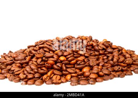 Heap of fresh roasted espresso coffee beans isolated on a white background Stock Photo