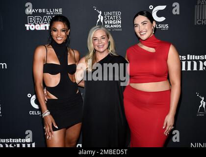 Cover models Yumi Nu, left, and Ciara pose with SI Swimsuit editor-in-chief  MJ Day