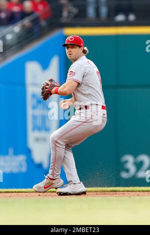 Cincinnati Reds' Kyle Farmer hits an RBI single during the fourth inning of  the team's baseball game against the Arizona Diamondbacks in Cincinnati,  Tuesday, April 20, 2021. (AP Photo/Aaron Doster Stock Photo 