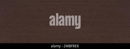 Texture of wenge wood. Dark brown wenge background. Natural brown wood texture, solid natural wood for furniture production Stock Photo