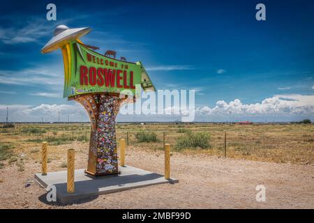 The colorful sign, north of the city on highway 285, welcoming travelers to Roswell, New Mexico. Stock Photo