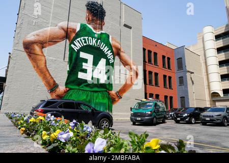 Teddy Gonzales takes a selfie in front of mural of Milwaukee Bucks' Giannis  Antetokounmpo painted on the side of a building Thursday, May 12, 2022, in  Milwaukee. The mural will be dedicated