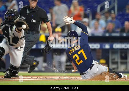 Milwaukee Brewers' Willy Adames, right, celebrates after his base hit  during the eighth inning of a baseball game against the Toronto Blue Jays,  Sunday, June 26, 2022, in Milwaukee. (AP Photo/Kenny Yoo