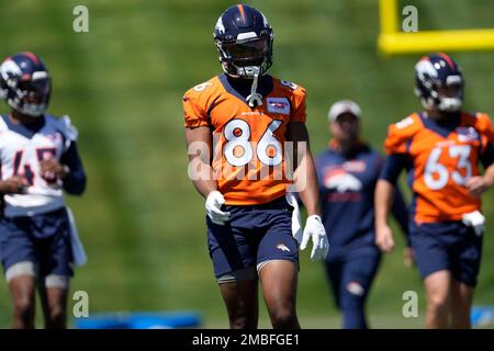 Denver Broncos running back Max Borghi (36) takes part in drills during the  NFL football team's training camp Friday, Aug. 5, 2022, at the Broncos'  headquarters in Centennial, Colo. (AP Photo/David Zalubowski