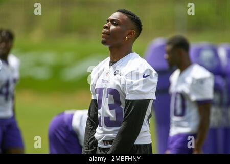 Minnesota Vikings cornerback Andrew Booth Jr. warms up before