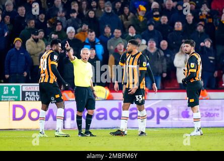 Hull City's Benjamin Tetteh (left) reacts after being shown a red card during the Sky Bet Championship match at Bramall Lane, Sheffield. Picture date: Friday January 20, 2023. Stock Photo