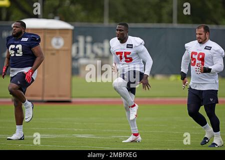 Houston Texans defensive end Adedayo Odeleye (75) gets past San