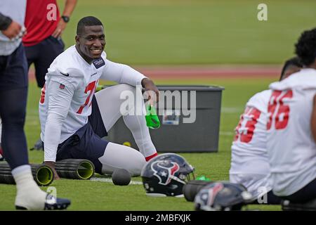 Houston Texans defensive end Adedayo Odeleye (75) walks toward the huddle  during the second half of an NFL preseason football game against the New  Orleans Saints Saturday, Aug. 13, 2022, in Houston. (