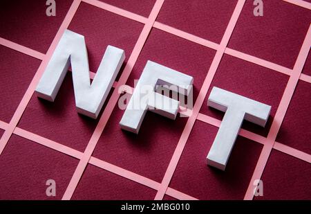 NFT text simol token based on blockchain as a concept of modern online digital technologies and cryptocurrency. High quality photo Stock Photo