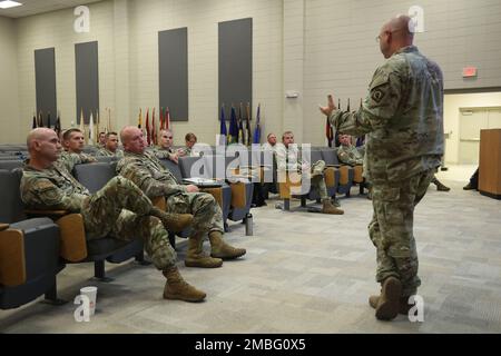 Col. William L. Henry, director of Military Support for Mississippi National Guard, briefs MSNG officers during the Hurricane Exercises held at the Gulfport Combat Readiness Training Center and surrounding coastal areas, June 15-18, 2022. The purpose of this event is to receive input from key civilian emergency management leadership, exercise critical elements, and synchronize all MSNG response elements. Stock Photo