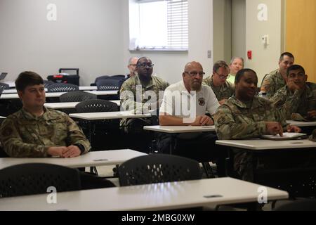 Mississippi National Guard Soldiers and civilians receive a briefing during the Hurricane Exercises held at the Gulfport Combat Readiness Training Center and surrounding coastal areas, June 15-18, 2022. The purpose of this event is to receive input from key civilian emergency management leadership, exercise critical elements, and synchronize all MSNG response elements. (U.S. Army National Guard photosby Staff Sgt. Don Kazery) Stock Photo