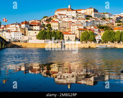 Stunning skyline of Coimbra reflected in Mondego river, Portugal Stock Photo