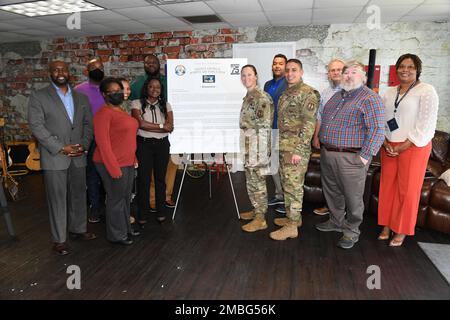 Col. Lindsay Droz, 78th Air Base Wing and Installation commander, stands with the staff of the Diversity Equity Inclusion and Accessibility office and attendees of the Robins Air Force Base Juneteenth Proclamation at the Refuge at Robins Air Force Base, Georgia, June 16, 2022. The base proclamation proclaimed that the 19th day of June should be celebrated as ‘Juneteenth or Emancipation Day’ in recognition of ‘Freedom Day’ and the spirit of Juneteenth that celebrates as African American Freedom, Education, and Achievement, while encouraging continuous self-development and respect for all cultur Stock Photo