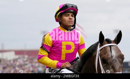 Jockey Luis Saez rides Charge It onto the track for the