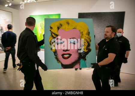 The 1964 painting Shot Sage Blue Marilyn by Andy Warhol is visible in Christie's showroom in New York City on Sunday, May 8, 2022. The auction house predicts the image of Marilyn Monroe will sell for $200 million on Monday, becoming the most expensive 20th-century artwork to sell at auction. (AP Photo/Ted Shaffrey)