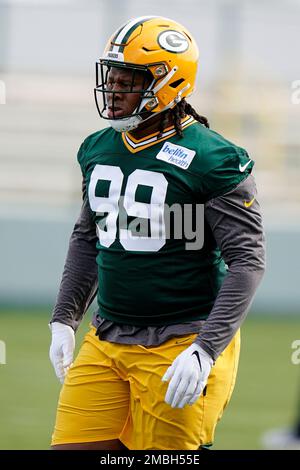 Green Bay Packers defensive tackle Jonathan Ford (99) and linebacker Quay  Walker (7) before an NFL preseason football game against the San Francisco  49ers in Santa Clara, Calif., Friday, Aug. 12, 2022. (