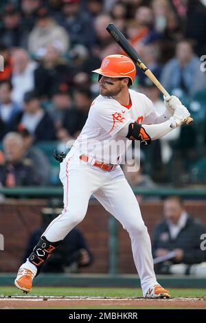 San Francisco Giants' Luis Gonzalez (51) scores a run behind Arizona  Diamondbacks catcher Jose Herrera on an error by infielder Sergio Alcantara  in the first inning during a baseball game, Wednesday, July