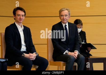 Tokyo, Japan. 21st Apr, 2016. (L to R) Bernard Arnault Chairman and CEO of  the luxury giant LVMH Moet Hennessy Louis Vuitton and his son Frederic  Arnault pose for the cameras during