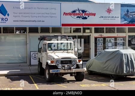 1984 Toyota Landcruiser white table top truck vehicle parked at a boat marina in Bayview,Sydney,NSW,Australia Stock Photo