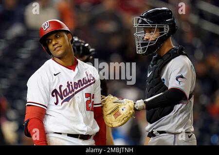 Washington Nationals' Juan Soto, front, stands in the dugout before a  baseball game against the Kansas City Royals, Saturday, July 6, 2019, in  Washington. The Nationals are paying tribute to the Montreal