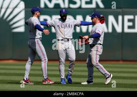 Oakland, USA. 26th May, 2022. Texas Rangers left fielder Brad Miller (13)  swings at a pitch during the second inning against the Oakland Athletics in  Oakland, CA Thursday May 26, 2022. (Image