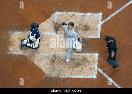 Pittsburgh Pirates' Daniel Vogelbach listens to home plate umpire