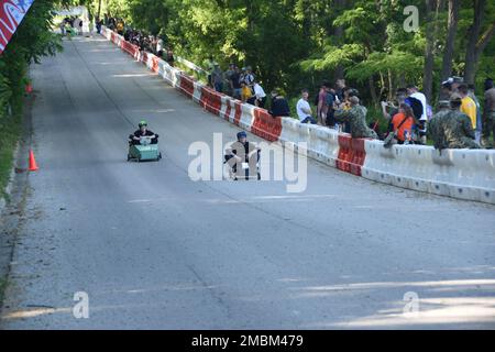 GREAT LAKES, Ill. (June 16, 2022) Sailors from Naval Station Great Lakes tenant commands participated in MWR's Derby Day on June 16. Sailors hand-built the downhill racers and competed for trophies and prizes. Stock Photo