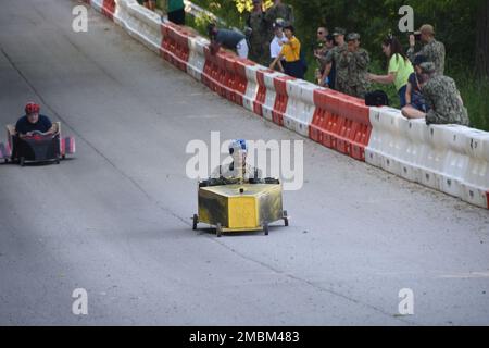 GREAT LAKES, Ill. (June 16, 2022) Sailors from Naval Station Great Lakes tenant commands participated in MWR's Derby Day on June 16. Sailors hand-built the downhill racers and competed for trophies and prizes. Stock Photo