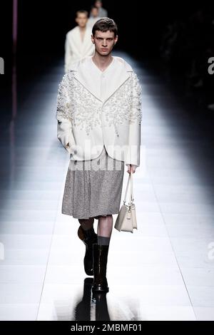Paris, France. 20th Jan, 2023. A model presents a creation from Dior Homme Fall/Winter 2023-2024 collection during the Men's Fashion Week in Paris, France, on Jan. 20, 2023. Credit: Piero Biasion/Xinhua/Alamy Live News Stock Photo