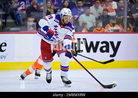 New York Rangers K Andre Miller 79 shakes hands with Carolina