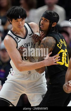 Brooklyn forward Yuta left, and Utah Jazz guard Jordan Clarkson battle for position during the first half of an NBA basketball game Friday, Jan. 20, 2023, Salt Lake