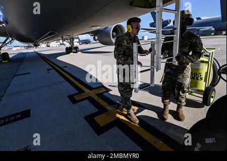 Airmen assigned to the 305th Air Mobility Wing conduct a post-flight inspection during the arrival of a KC-46A Pegasus on Joint Base McGuire-Dix-Lakehurst, N.J., Jun. 17, 2022. The KC-46A Pegasus is a wide body, multirole tanker that can refuel all U.S., allied and coalition military aircraft compatible with international aerial refueling procedures. Stock Photo