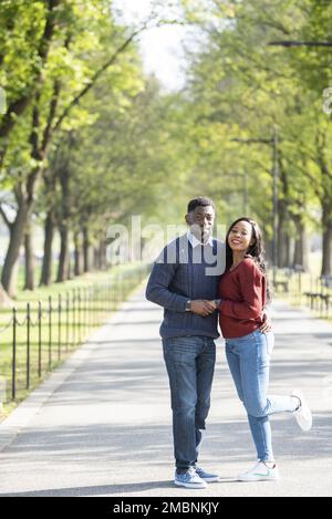 A young Nigerian couple visits the National Mall in Washington, D.C. to celebrate their engagement. Stock Photo