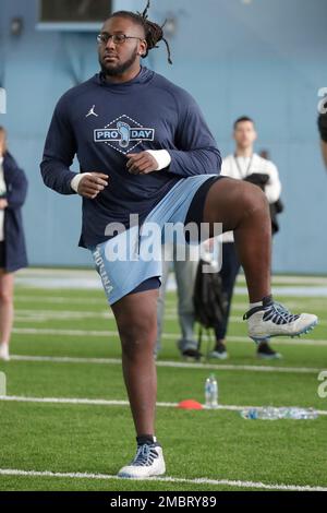 North Carolina offensive lineman Joshua Ezeudu runs the 40-yard dash during  the NFL football scouting combine, Friday, March 4, 2022, in Indianapolis.  (AP Photo/Darron Cummings Stock Photo - Alamy