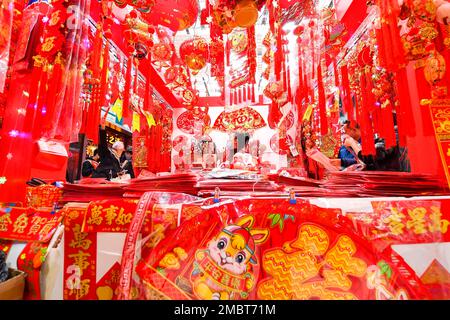 People select Spring Festival decorations at a market in Beijing, China ...