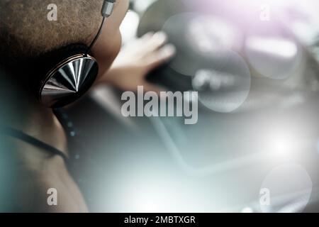 Black woman, DJ and listening to music for party or club in celebration, sound or light with technology. African American female musician with Stock Photo