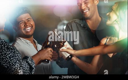 People, beer or toast circle in party, nightclub event or bokeh disco for birthday celebration, friends drinks or social gathering. Smile, happy or Stock Photo